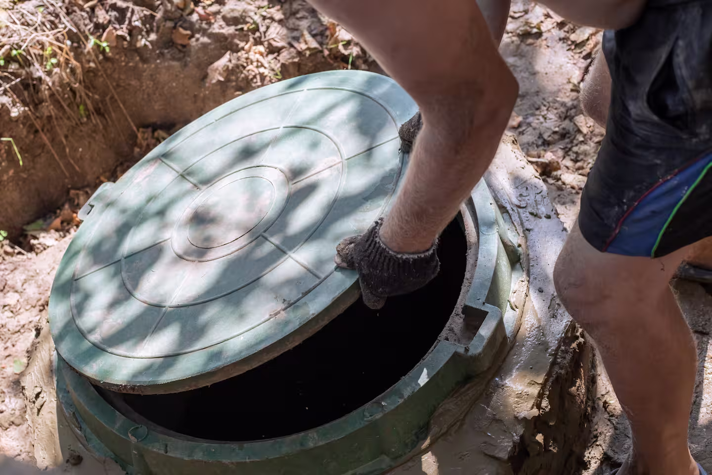 Advanced Septic Service technician handling septic system services at a Northern Arizona home