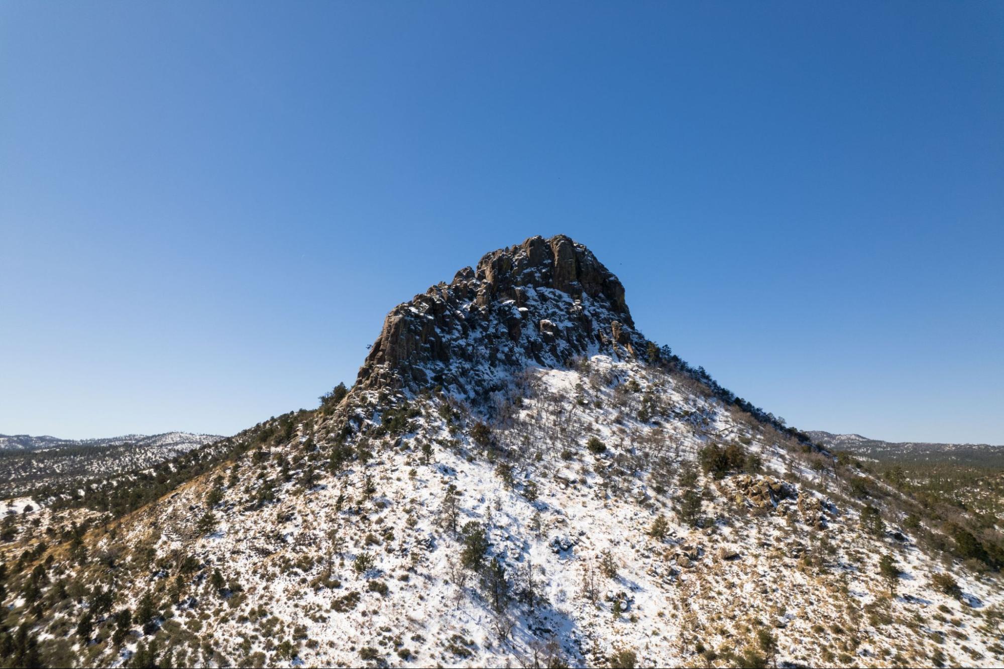 Snow on Thumb Butte outside Prescott, AZ, where Advanced Septic Service provides septic services.